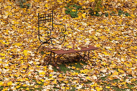 scrolled black metal armchair with yellow flowers thumbnail