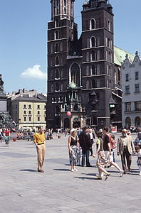 people on street near concrete buildings during daytime thumbnail