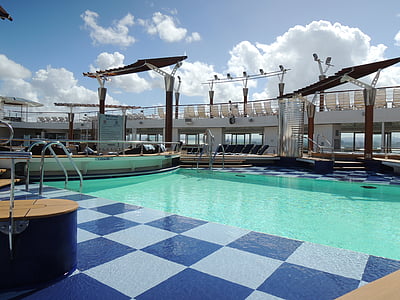 white and gray ceramic tiles beside swimming pool thumbnail