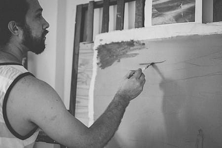 Grayscale Photo of Man Painting thumbnail