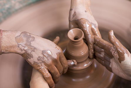 two people making pottery thumbnail