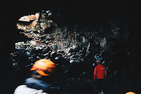 people walking inside cave thumbnail
