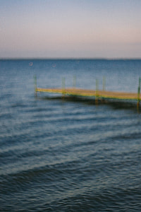 Wooden pier by the sea thumbnail