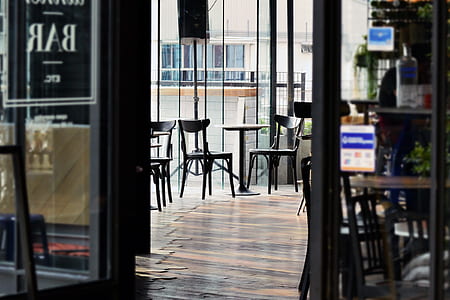 patio bistro set near cafe window thumbnail