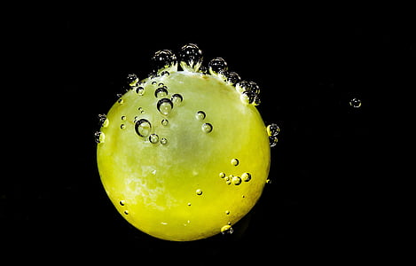 time lapse photography of yellow water drop thumbnail