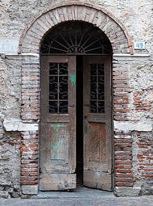 half opened brown wooden door thumbnail