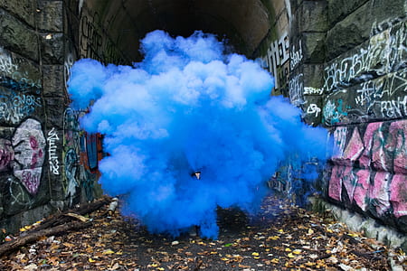 blue smoke spread between walls thumbnail