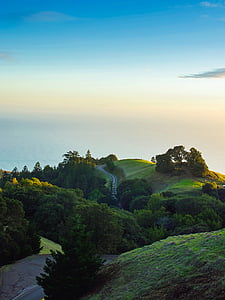 landscape photography of green grass field thumbnail