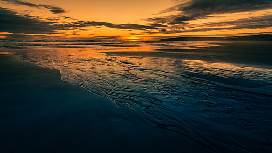body of water at daytime thumbnail