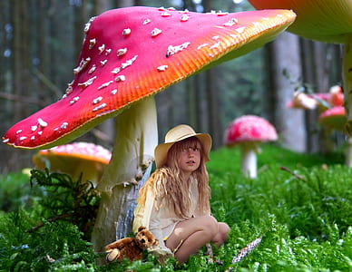 girl sitting under pink mushroom thumbnail