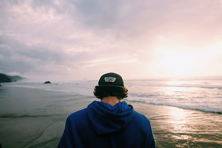 man wearing hat near the sea thumbnail
