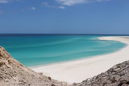 photo of seashore during daytime thumbnail