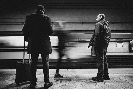 Three Person Standing on Infront of Bullet Train thumbnail