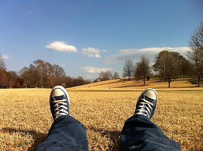 Park relaxing time, person wearing black jeans thumbnail