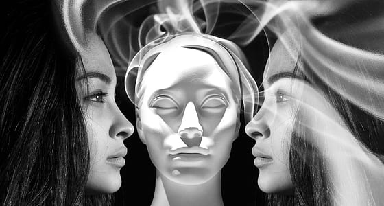 grayscale photo of woman portrait with smoke thumbnail
