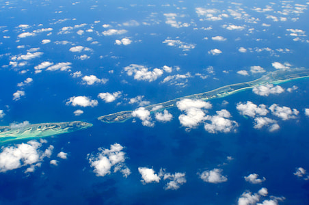 Sky and Clouds over the Landscape of the Maldives thumbnail