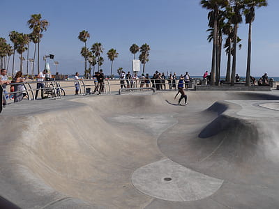 man doing skateboard stunt at skatepark thumbnail