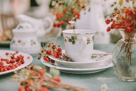 white floral ceramic cup and saucer thumbnail
