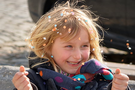 girl smiling with confetti thumbnail