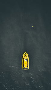photo of yellow personal watercraft on body of water thumbnail