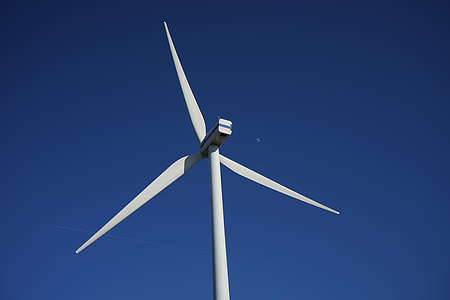 windmill under clear blue sky thumbnail