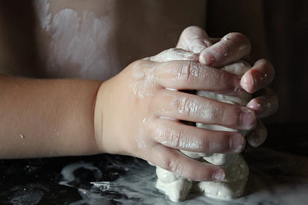 toddler's holding white clay thumbnail