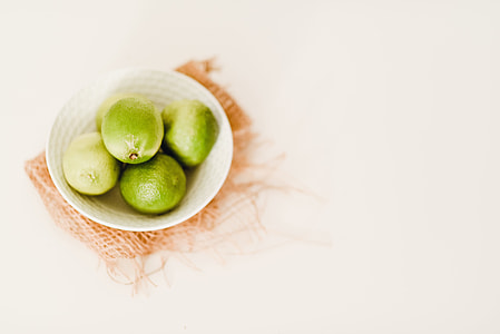 A bowl of limes thumbnail