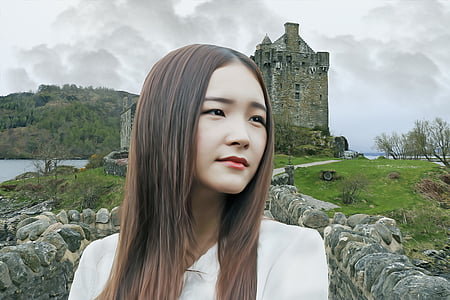 woman standing near stone walls thumbnail