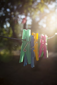 assorted-color clips on black wire thumbnail