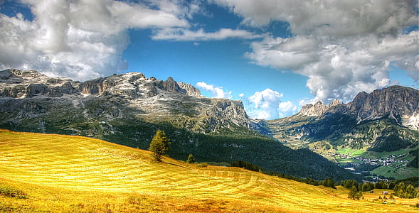 white snow cap mountain over brown grass field during daytime thumbnail
