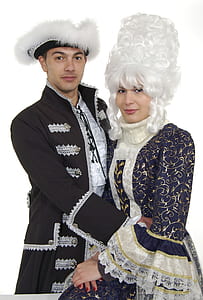 man and woman wearing Victorian costume thumbnail