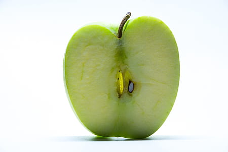 granny smith apple sliced in half thumbnail