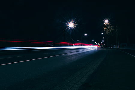 time lapse photo of road during nighttime thumbnail
