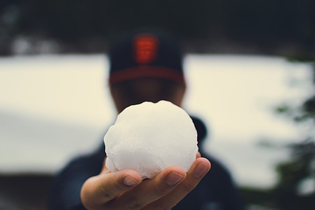 person holding snowball thumbnail