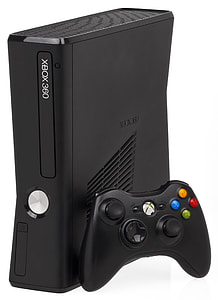 black Microsoft Xbox 360 with controller thumbnail