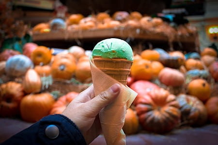 person holding ice cream thumbnail
