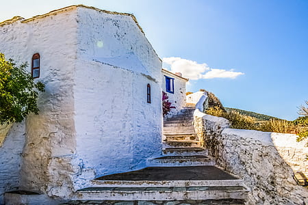 white painted concrete building thumbnail