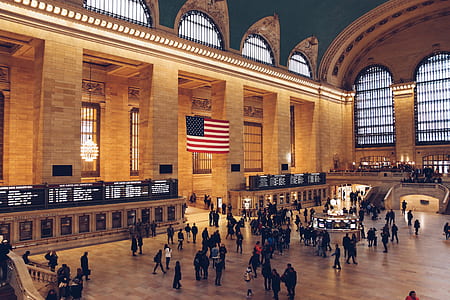 people standing inside the building at daytime thumbnail