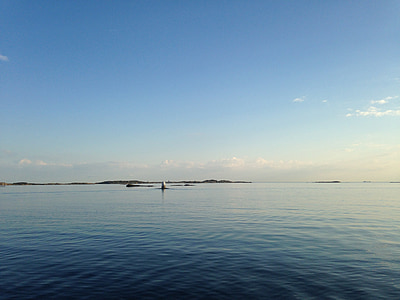 rippling sea under white clouds at daytime thumbnail
