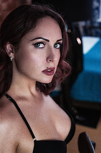 woman wearing black brassiere taking self portrait inside well lighted thumbnail