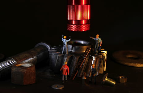 shallow focus photography of grey hand tool thumbnail