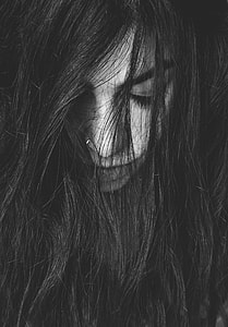 grayscale photography of woman face thumbnail