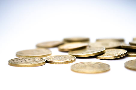 collection of round gold-colored coins thumbnail