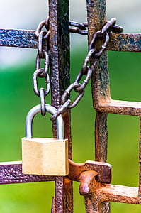 copper-colored pad lock with chain thumbnail