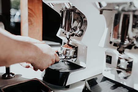 person using espresso machine thumbnail