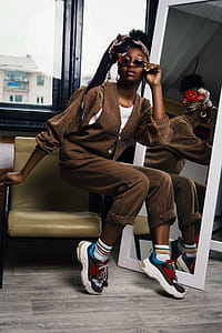 Woman Wearing Brown Overall thumbnail