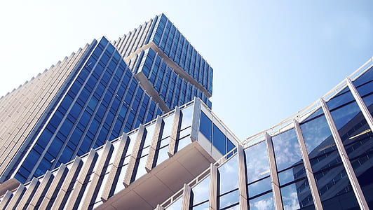 low-angle photo of high-rise building during daytime thumbnail