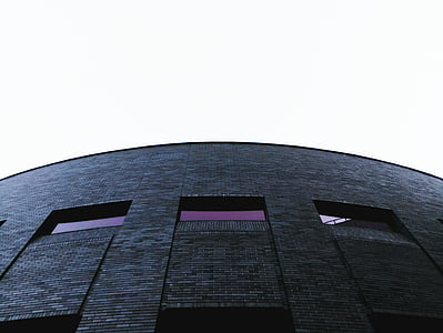 low angle photo of black high-rise building thumbnail