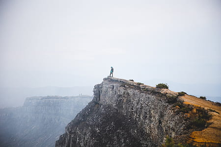 person standing on hill thumbnail