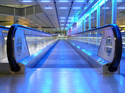 low lighted photo of gray flat escalator thumbnail